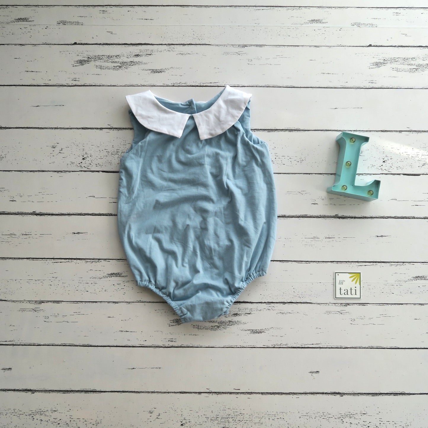 Cosmos Playsuit in Light Blue Stretch