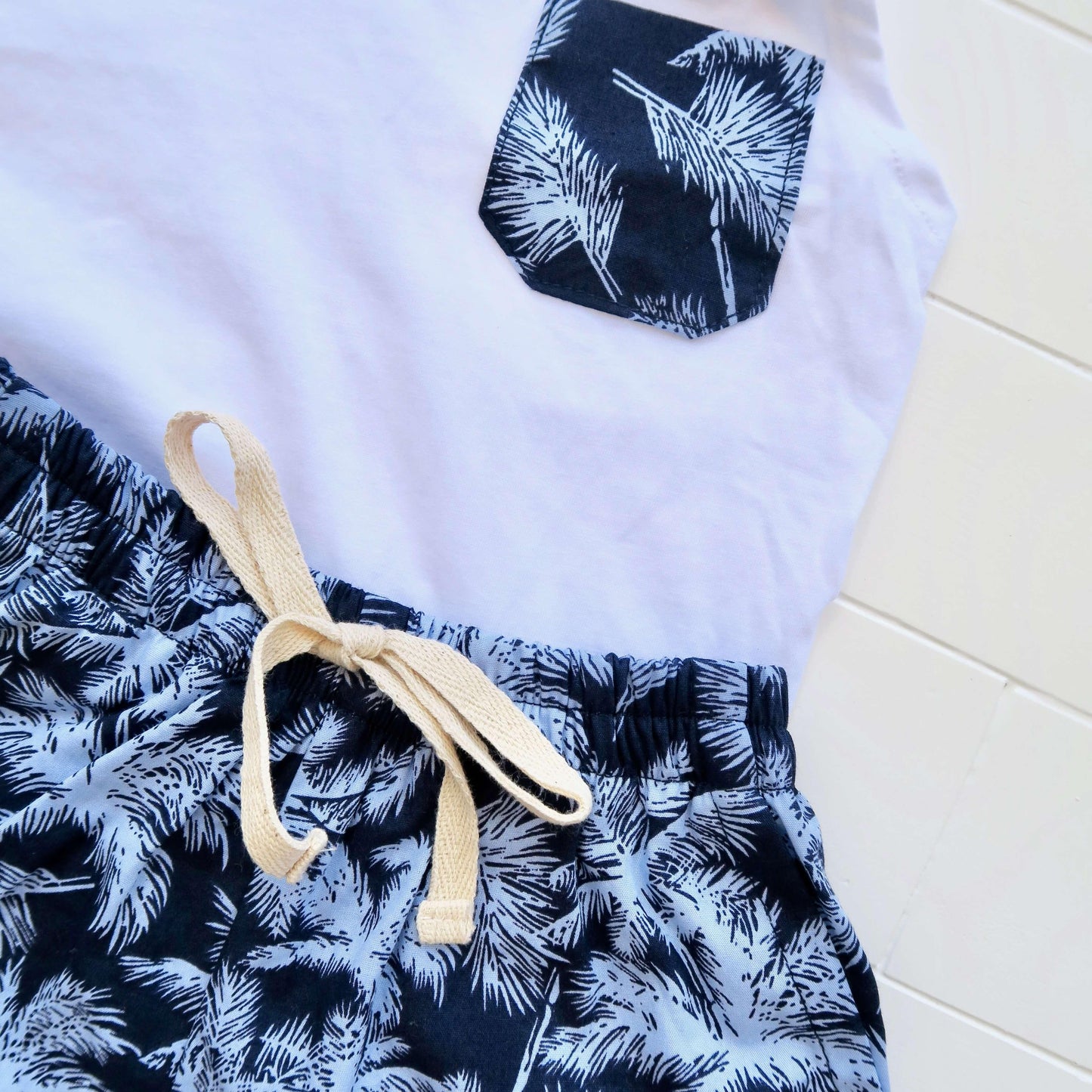 Caper Sleeveless Top & Shorts in Blue Coconut Trees and White Stretch - Lil' Tati